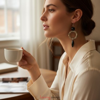 Round metal earrings with black onyx